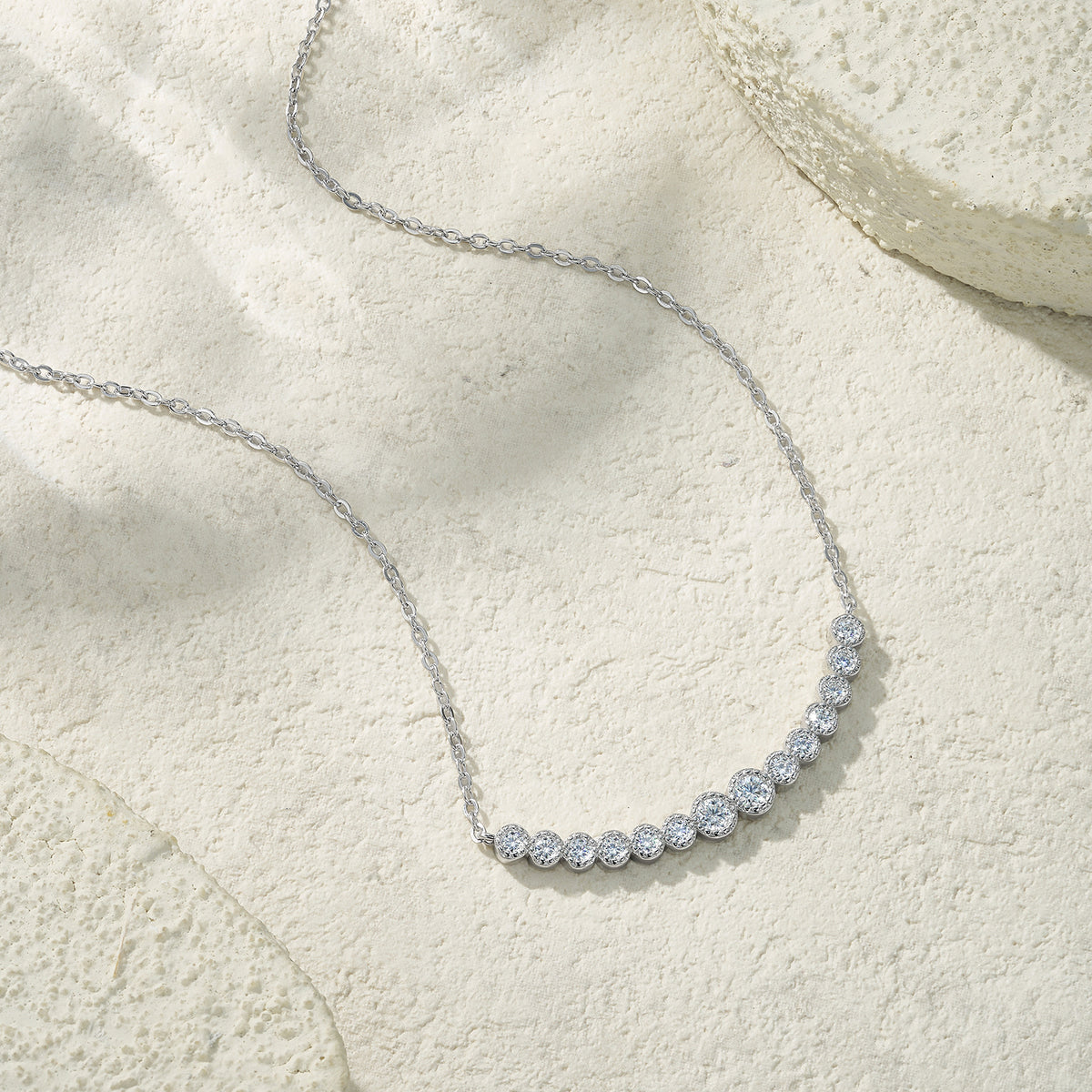 Graduated Round Brilliant Moissanite Station Necklace